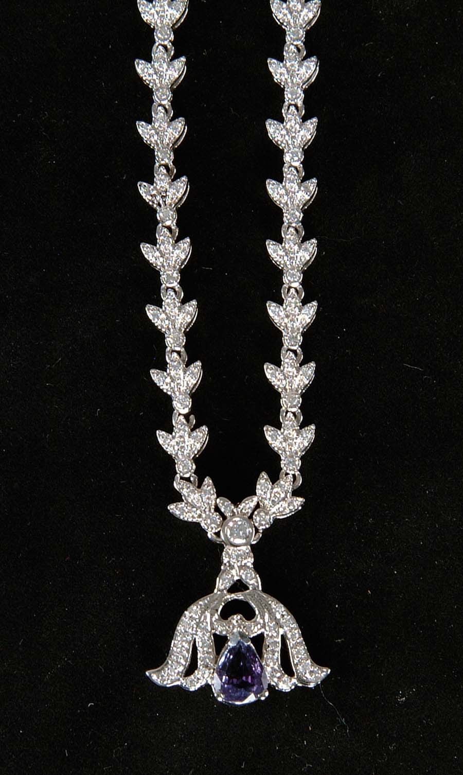 Appraisal: DIAMOND TANZANITE NECKLACE Elegant k white gold necklace features leaf