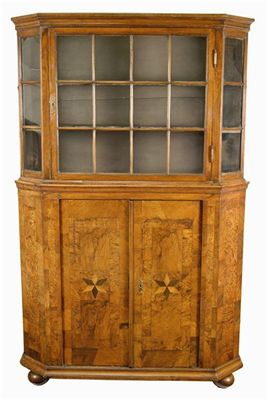 Appraisal: A th century Dutch walnut cabinet in two parts having