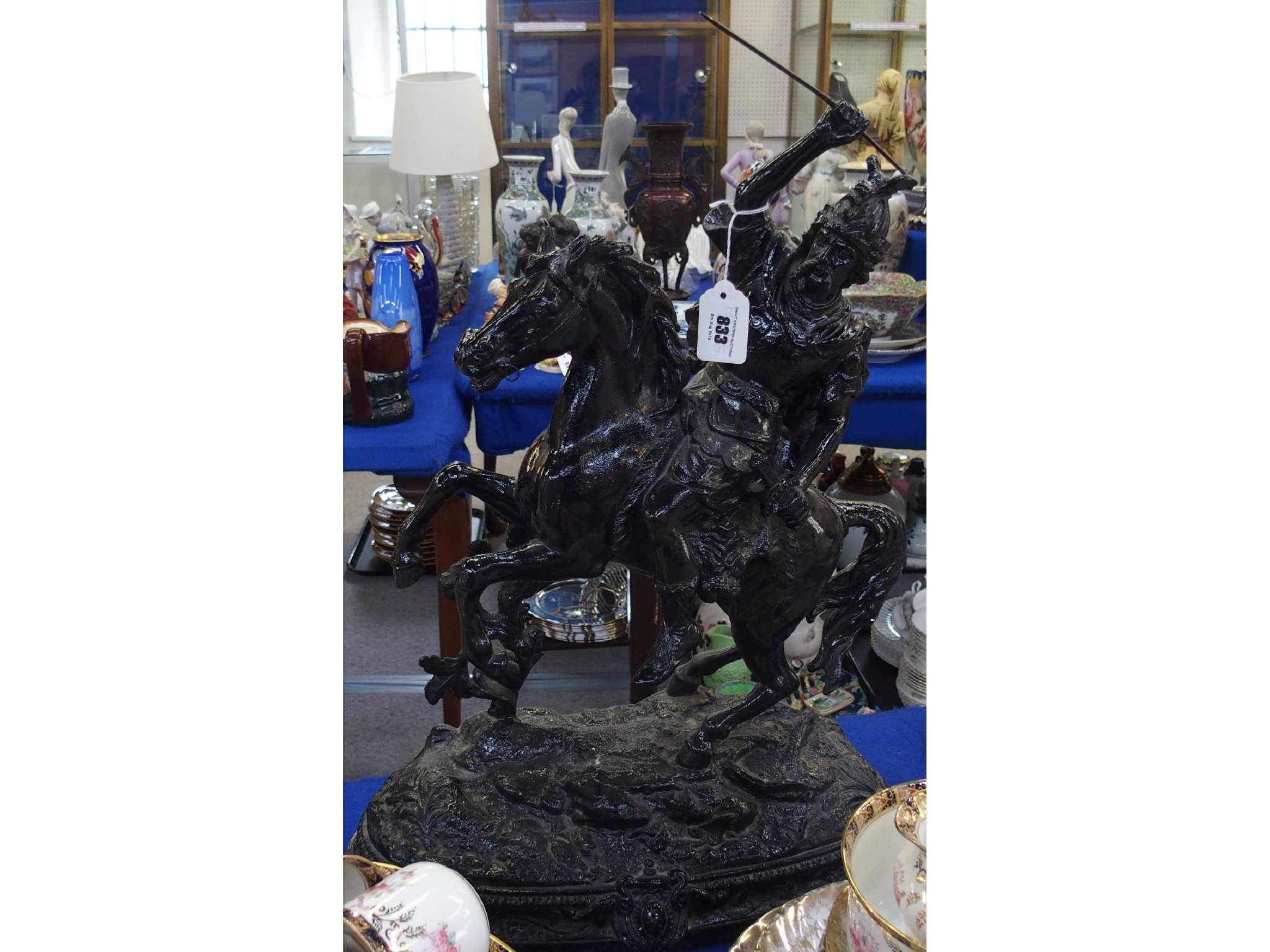 Appraisal: Cast metal figure of a horse and warrior rider