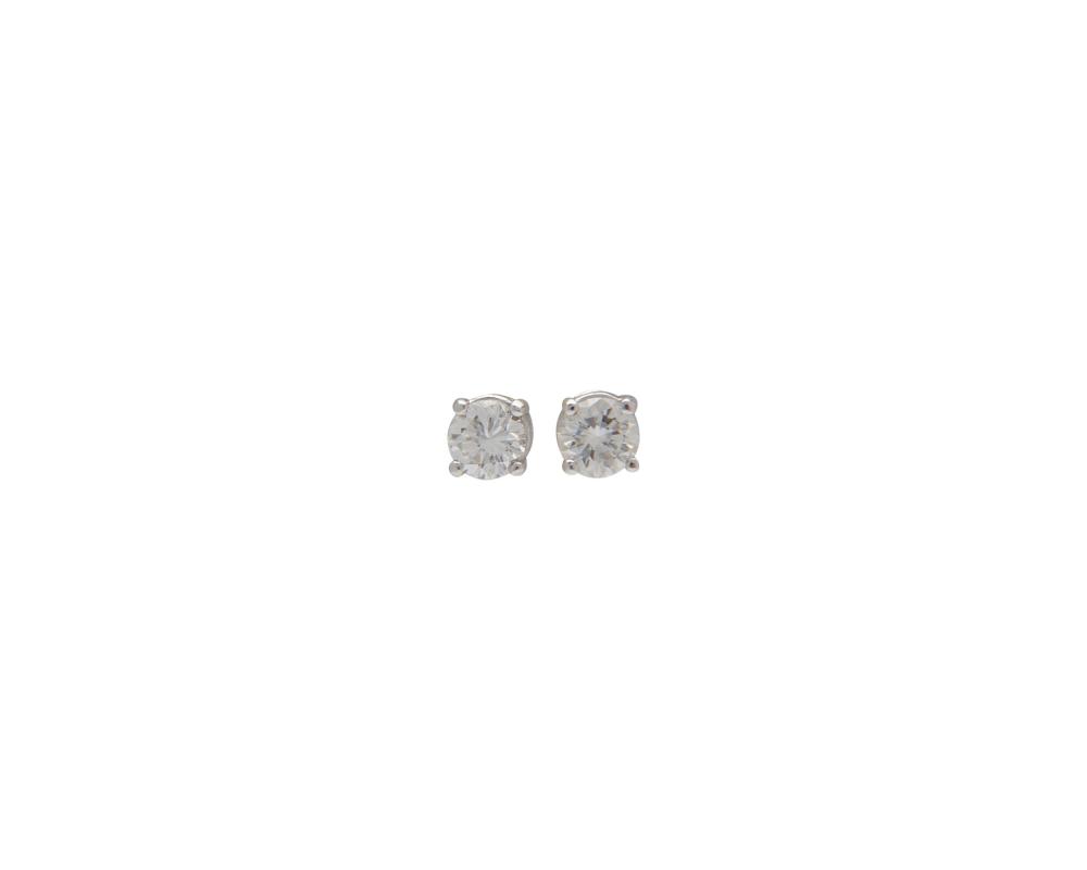 Appraisal: Platinum and Diamond Stud Earrings each featuring a four-prong basket-set