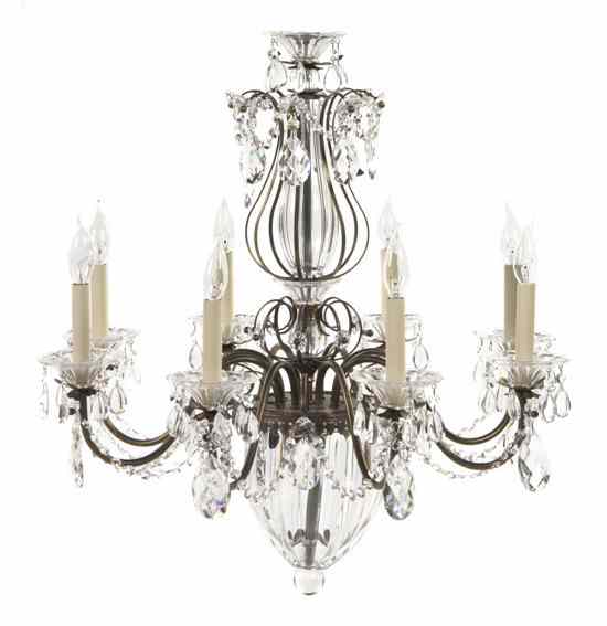 Appraisal: A Brass and Cut Glass Eight-Light Chandelier having a caged