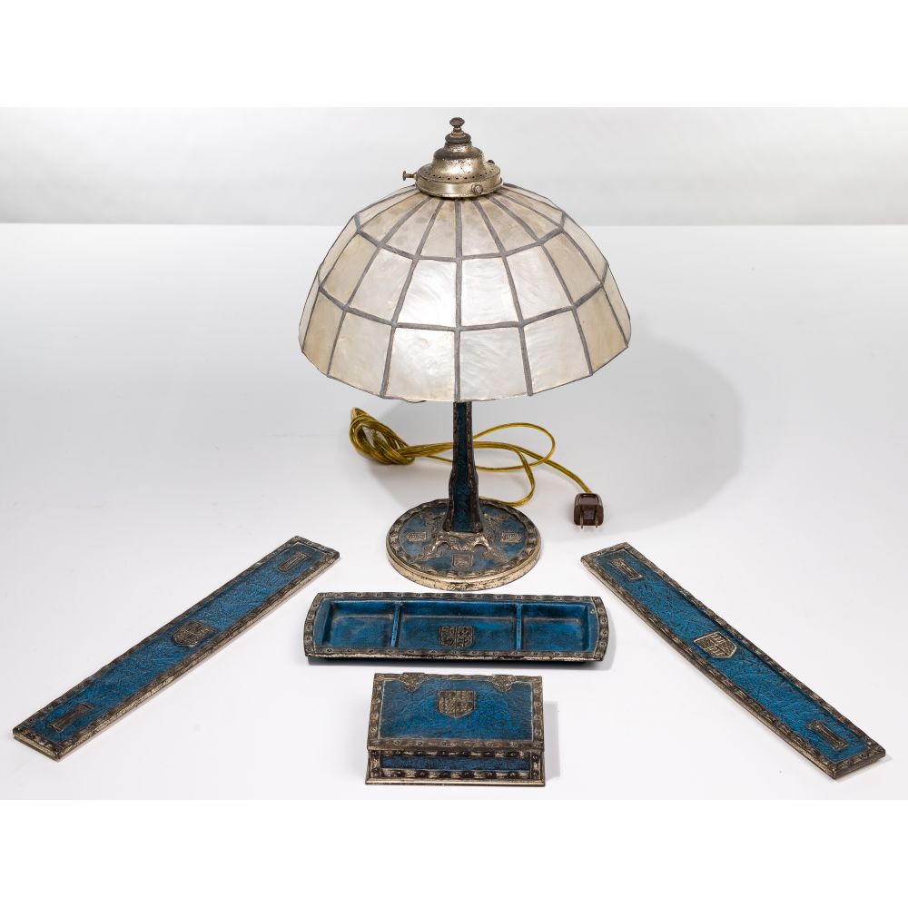 Appraisal: TIFFANY STUDIOS HERALDIC DESK SET items having blue enamel and