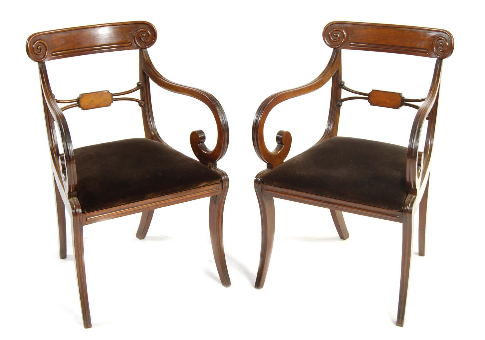 Appraisal: A pair of George IV mahogany open armchairs