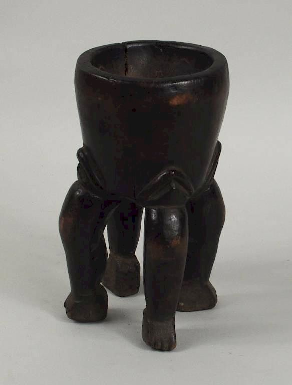 Appraisal: African Carved Wood Four Legged Chalice African carved wood four