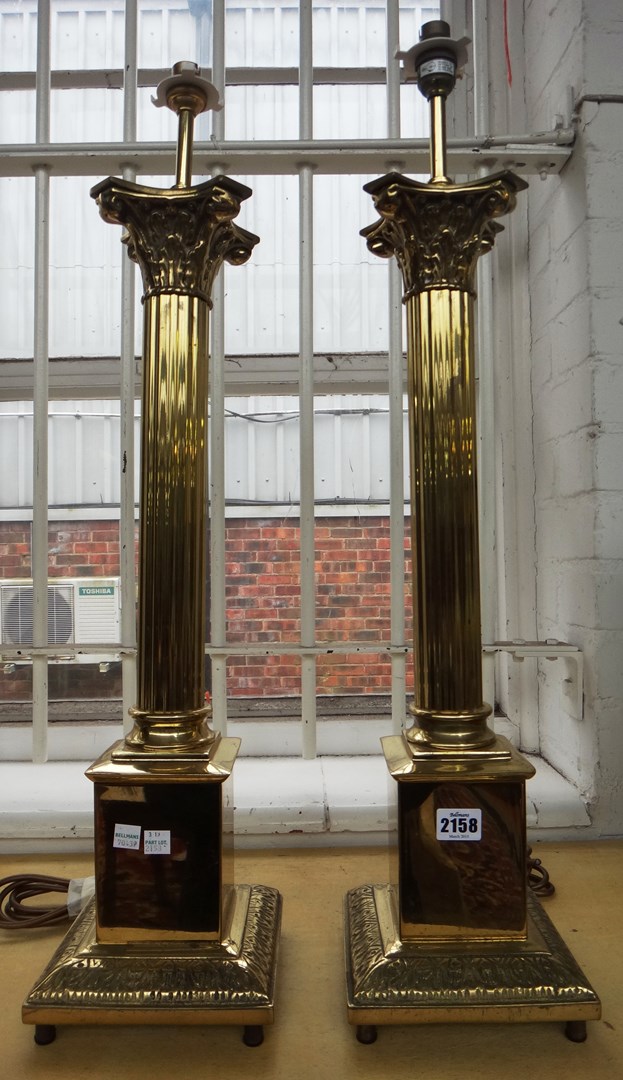 Appraisal: A pair of modern brass table lamps of Corinthian column