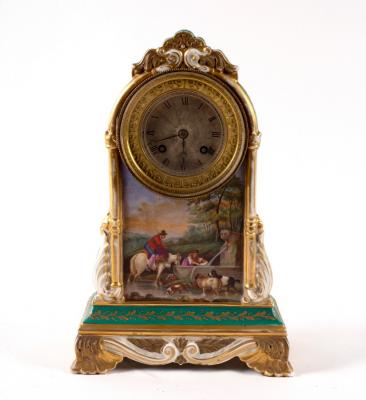 Appraisal: A French porcelain cased mantel clock circa the silvered dial