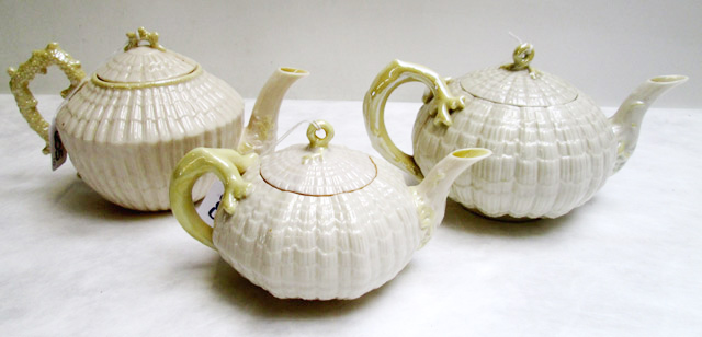 Appraisal: THREE BELLEEK PARIAN PORCELAIN TEA POTS the largest marked rd