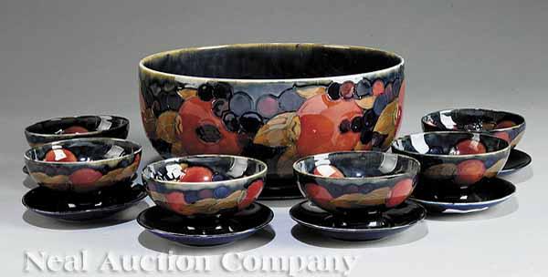 Appraisal: A William Moorcroft Pottery Fruit Set in the Pomegranate Design