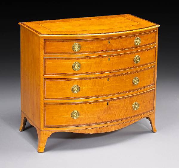 Appraisal: A George III satinwood bowfront chest of drawers late th