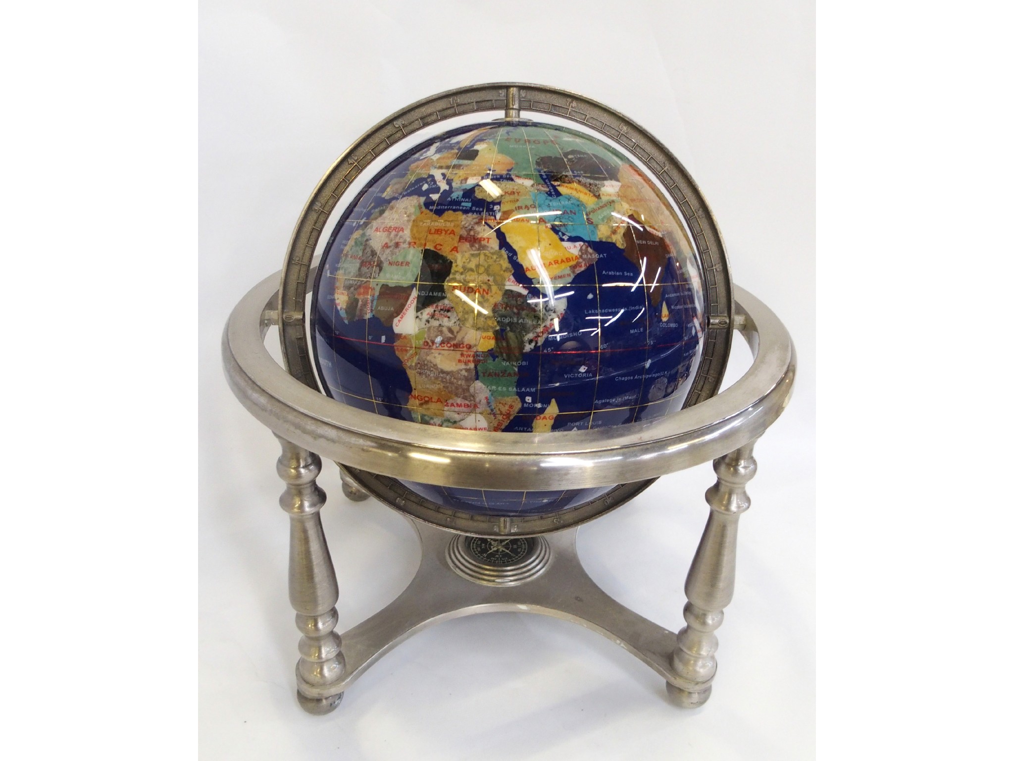 Appraisal: Semi precious stone inlaid globe of the world on white