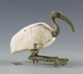 Appraisal: Egyptian Bronze Ibis Sculpture Egyptian bronze and wood ibis sculpture