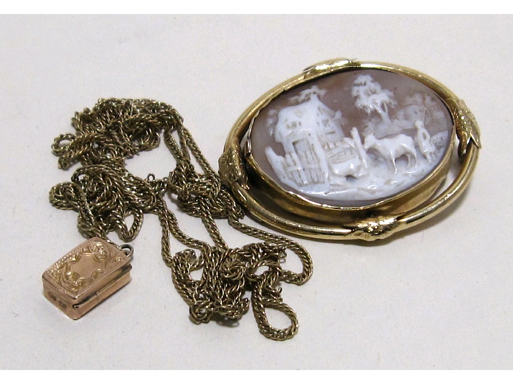 Appraisal: Victorian ct gold vinaigrette on inch yellow metal guard chain