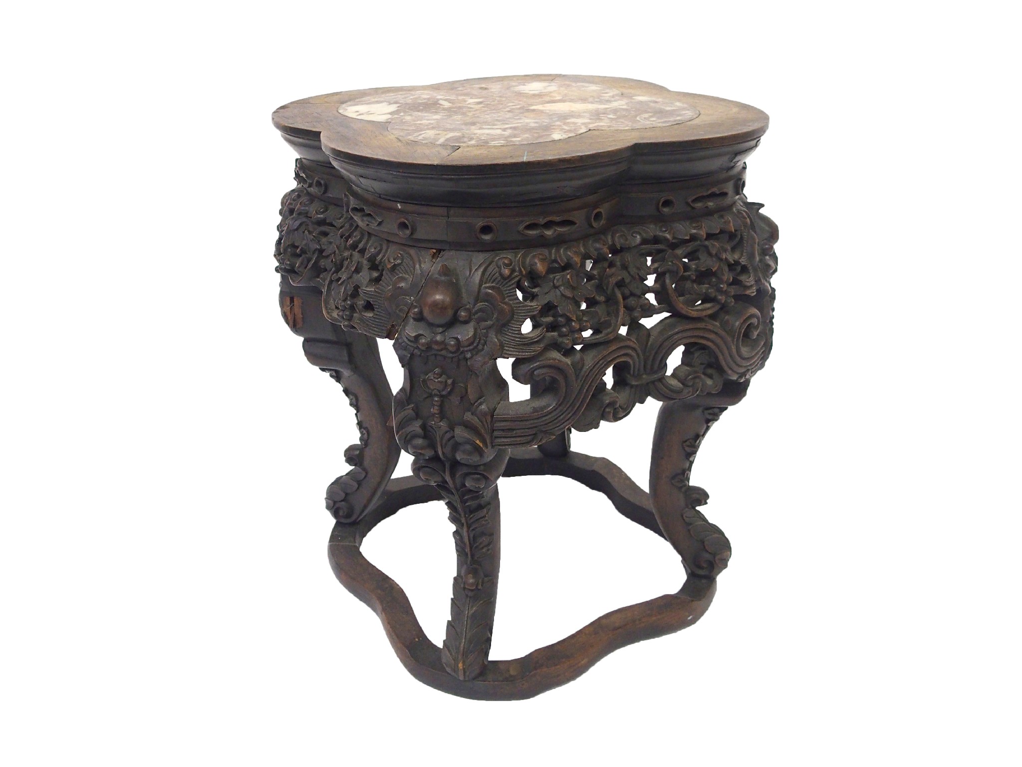 Appraisal: A Chinese carved hardwood pedestalwith inset quatrefoil marble top above