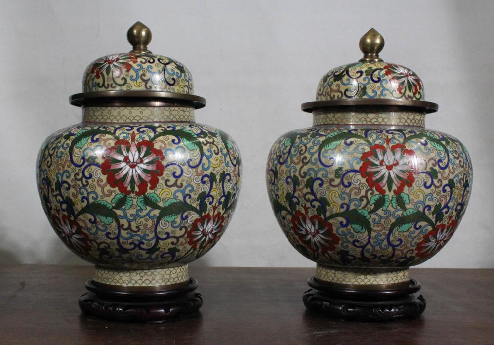 Appraisal: PAIR OF CHINESE CLOISONNE LIDDED JARS squat form with domed