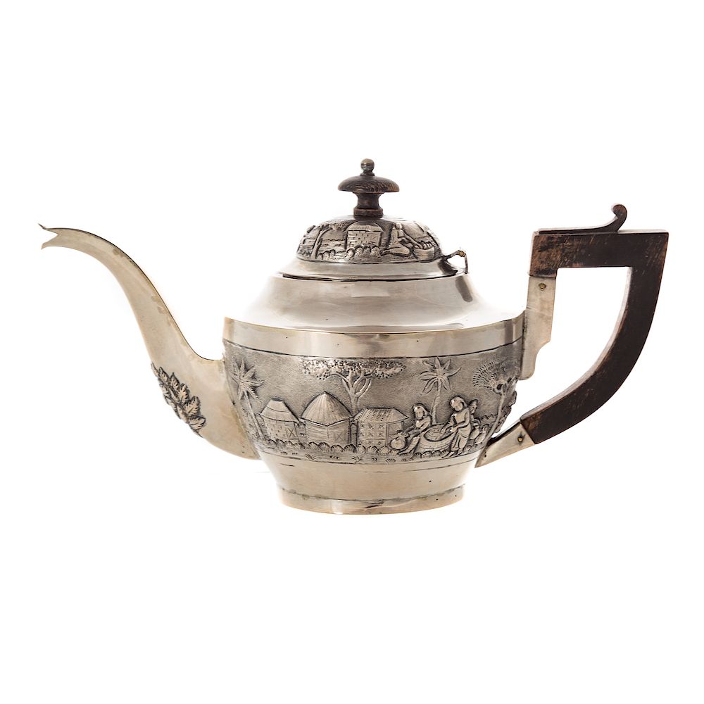 Appraisal: Asian Silver Teapot probably Chinese with high relief cultivation of