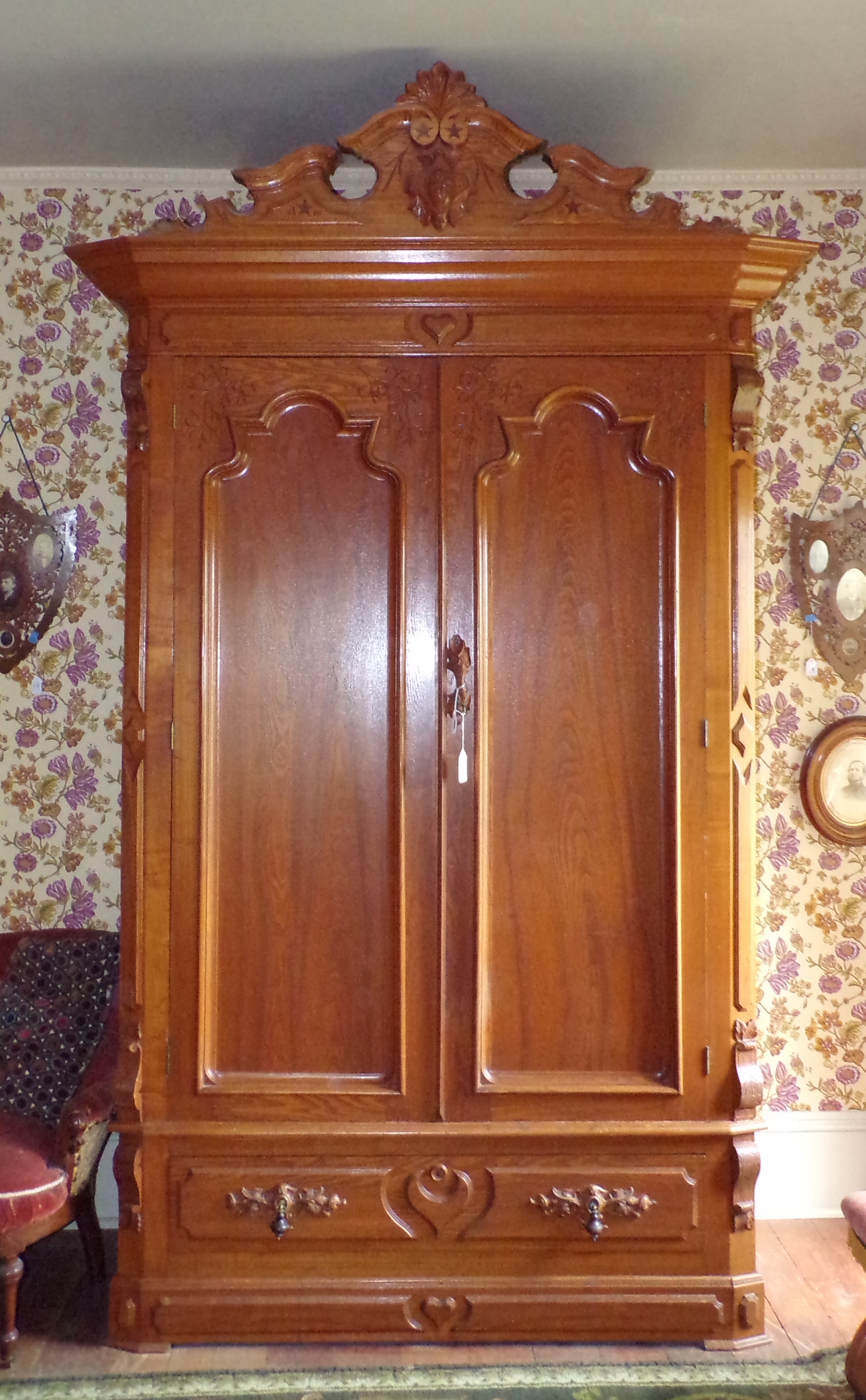 Appraisal: Victorian walnut breakdown wardrobe carved crest with paneled doors with