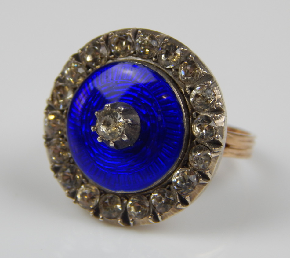 Appraisal: A Victorian memorial ring set with white paste stones on