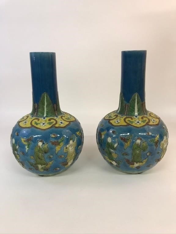 Appraisal: Pair of Asian blue ceramic water bottles decorated with court