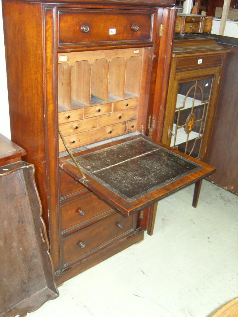 Appraisal: A mid Victorian mahogany secretaire Wellington chest the front elevation