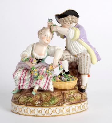 Appraisal: A Meissen figure group of Spring modelled as a girl