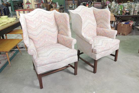 Appraisal: TWO HICKORY WING CHAIRS Walnut frames with reeded legs and