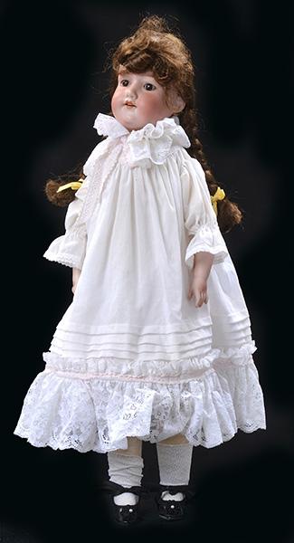 Appraisal: AN ARMAND MARSEILLE AM BISQUE HEAD DOLL AND LOWER ARMS