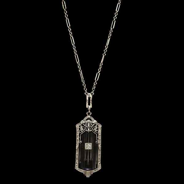 Appraisal: k Art Deco Rock Crystal and Diamond Pendant Ca k