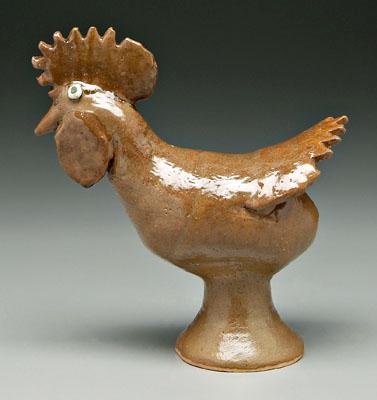 Appraisal: Reggie Meaders stoneware rooster brown glaze signed below tail Reggie