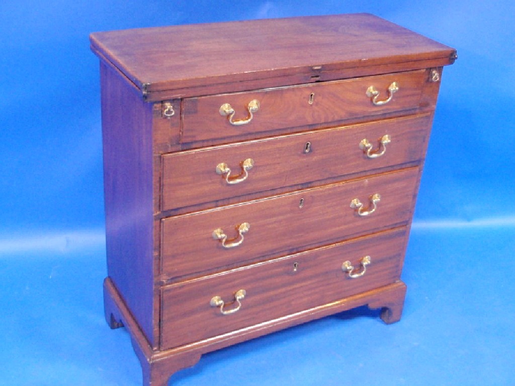 Appraisal: A George III mahogany bachelors chest with turnover top and