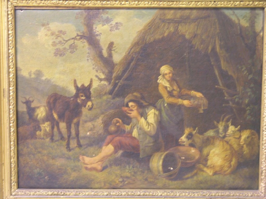 Appraisal: A pair of th century oils on canvas peasant scenes