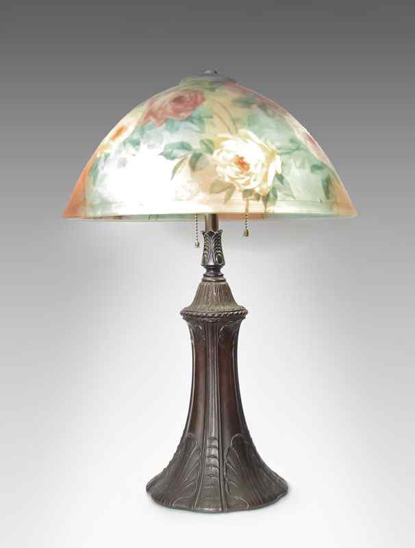 Appraisal: REVERSE PAINTED LAMP Patinated metal light base with foliate design