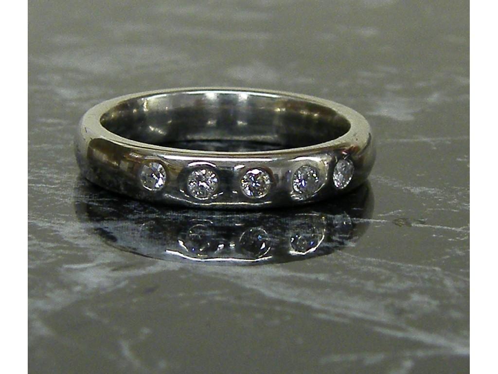 Appraisal: Modern platinum five stone diamond band ring ct approx gm