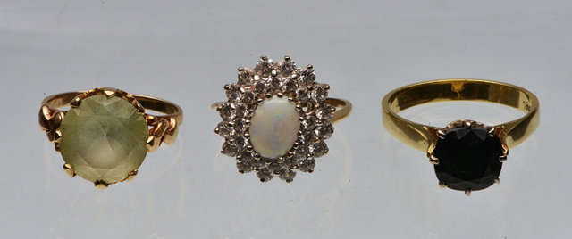 Appraisal: AN OPAL AND WHITE STONE CLUSTER RING set in ct