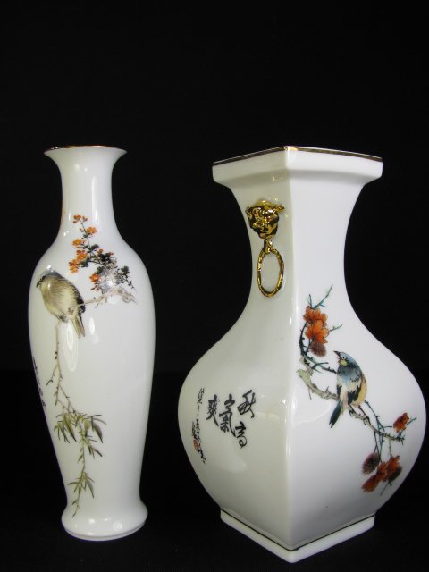 Appraisal: Two th century Chinese porcelain vases signed and hand painted