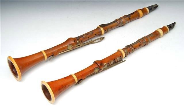 Appraisal: AN EARLY BOX WOOD AND TURNED IVORY CLARINET in 'C'