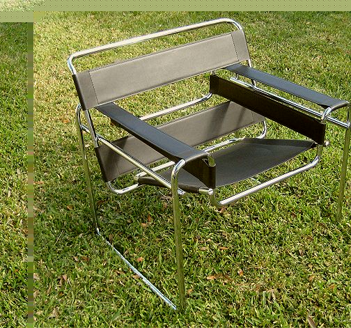 Appraisal: MARCEL BREUER WASSILY CHAIR Chrome metal tube and leather construction