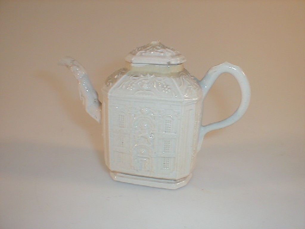 Appraisal: A rare mid th century small salt glazed teapot moulded