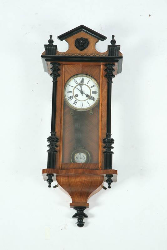 Appraisal: GERMAN WALL CLOCK Eight day time and strike with a