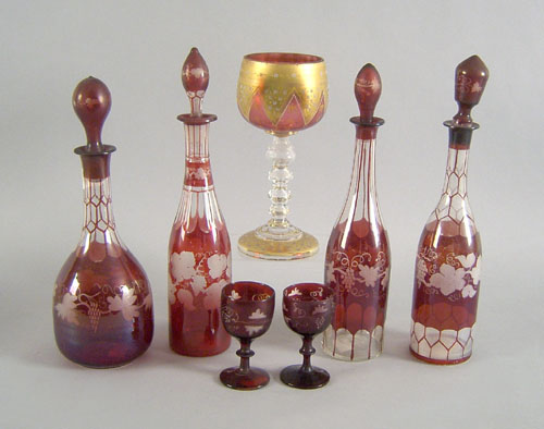 Appraisal: Ruby glass decanters h to h together with an enamel