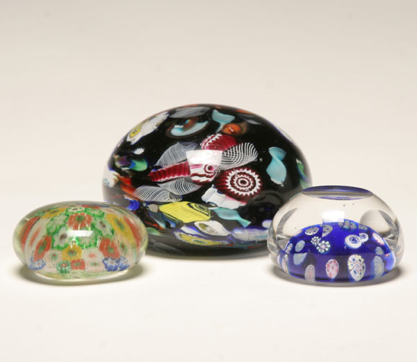 Appraisal: Art glass paperweights one Pairpoint dimpled millefiori along with two