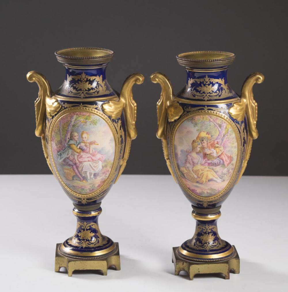 Appraisal: PAIR OF 'SEVRES' PORCELAIN URNS French th century H