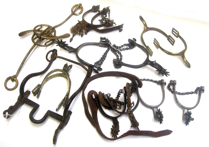 Appraisal: EIGHT EQUESTRIAN ITEMS six pairs of unmarked spurs all are