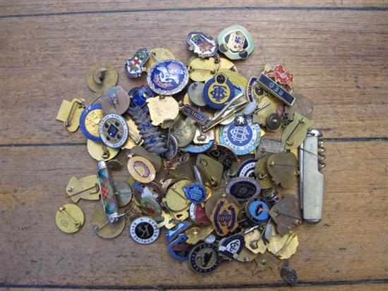 Appraisal: ONE BAG OF ASSORTED ENAMELLED BADGES AND TWO POCKET KNIVES