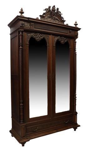 Appraisal: French walnut armoire late th c carved crest with putti