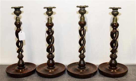 Appraisal: Sale Lot A Set of Four Twisted Wood Candlesticks Height