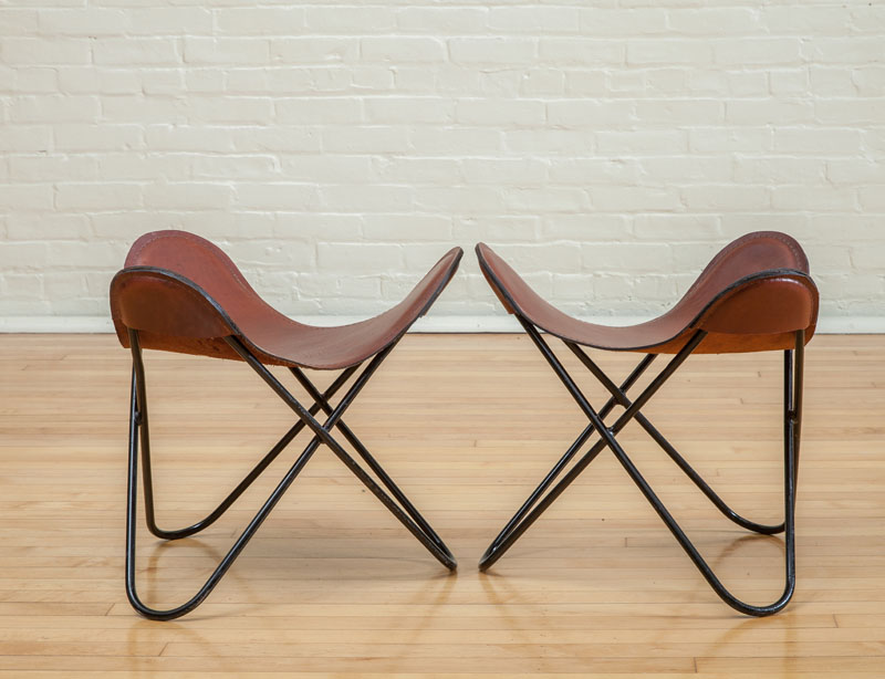 Appraisal: PAIR OF KNOLL BUTTERFLY STOOLS Unmarked black painted steel leather