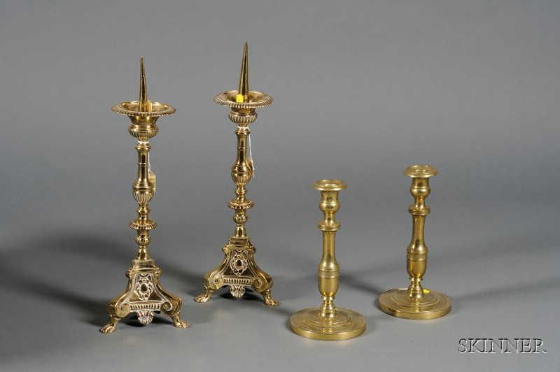 Appraisal: Two Pairs of Continental Brass Candleholders a pair of Charles