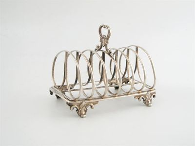 Appraisal: A Victorian silver seven-bar toast rack by E and J