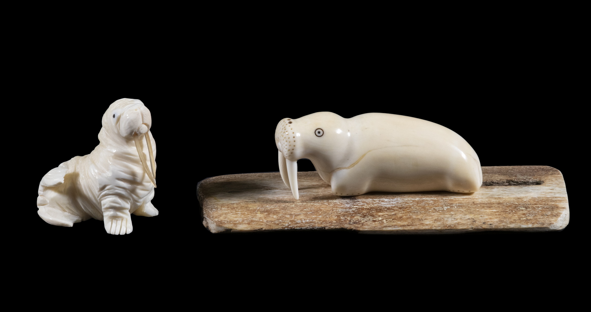 Appraisal: INUIT SCULPTURES OF WALRUSES BY DENNIS H PUNGOWIYI Yuit Siberian