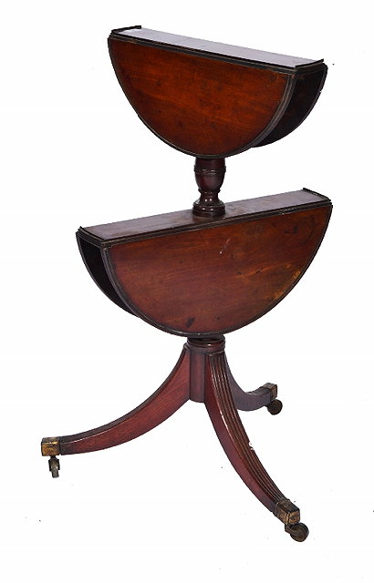 Appraisal: A REGENCY MAHOGANY TWO TIER DROP FLAP DUMB WAITER each